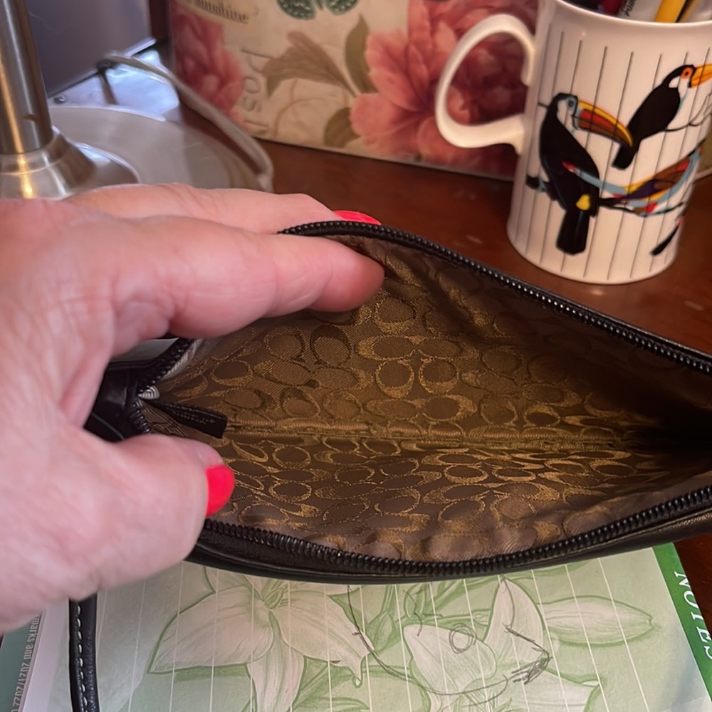 Coach wristlet, black with zipper on top.  7 1/2 by 4 1/2 “. Very clean. - Picture 3 of 4